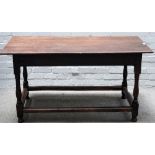 A 17th century oak refectory table,