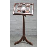 A Continental mahogany height adjustable sheet music stand,