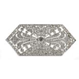 An Art Deco style diamond-set brooch of lozenge shaped plaque design,