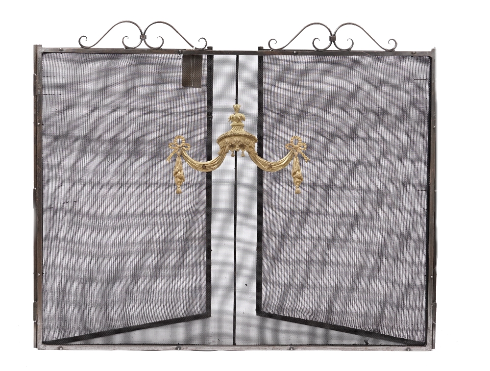 An ebonised steel folding fire screen, with triptych mesh panels, 89cm high, 250cm wide overall.