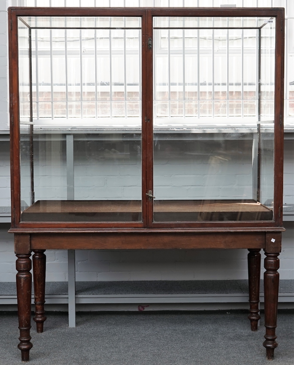 A pair of large 19th century mahogany rectangular museum display cases, on turned supports,