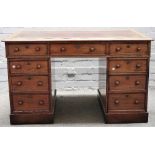 A Victorian mahogany pedestal desk, with nine drawers about the knee, 123cm wide x 73cm high.