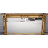 A William IV gilt framed mirror, with floral moulded split turned decoration,