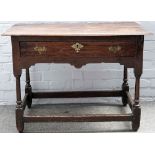 A late 17th century oak lowboy, the moulded rectangular top above a frieze drawer,