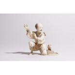 A Japanese ivory okimono of a rat catcher, Meiji period,