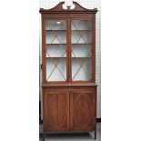 An Edwardian inlaid mahogany display cabinet cupboard, on tapering square supports,