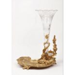An ormolu and glass Louis XV style vase, with an asymmetrical foliate cast base, 51cm high.