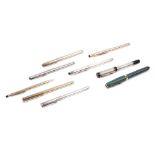 A Dunhill ballpoint pen with silvered engine turned decoration and eight further pens,