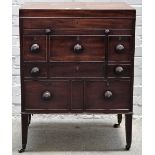 An early 19th Century mahogany campaign chest with brass carrying handles