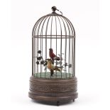 A reproduction automaton bird cage with musical movement, 26cm.