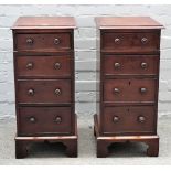 A pair of mid-18th century style mahogany four drawer pedestals on bracket feet,