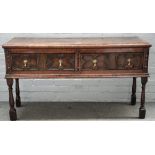 A late 17th century oak low dresser,