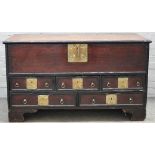 A 19th century Indian brass mounted teak mule chest, the lift top over five drawers on bracket feet,
