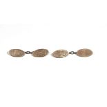 A pair of 9ct gold oval cufflinks,