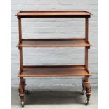 A George IV mahogany three tier dumb waiter on trestle supports, 91cm wide x 116cm high.