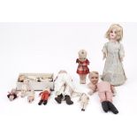 A quantity of early 20th century porcelain dolls, including Armand Marseille,