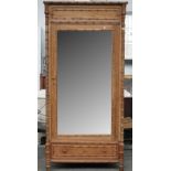 A 19th century French pitch pine faux bamboo mirrored single door wardrobe, 102cm wide x 212cm high.