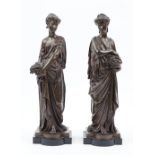 A pair of late 19th century bronze female figures,