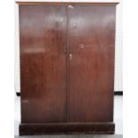 COMPACTON 143 REGENT ST LONDON, an early 20th century mahogany fitted two door wardrobe,