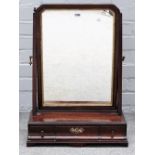 A George II parcel gilt mahogany toilet mirror, with cushion three drawer base,