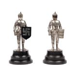 A pair of white figural table lighters, mid to late 20th century,