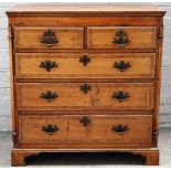 A mid-18th century oak chest with two short over three long graduated drawers, on bracket feet,