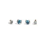 A pair of 18ct white gold, blue topaz and diamond-set earstuds, the oval-cut blue topaz,