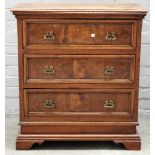 An 18th century Italian walnut small chest of three long drawers, on bracket feet,