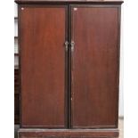 COMPACTON 143 REGENT ST LONDON, an early 20th century mahogany fitted two door wardrobe,