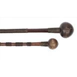 An African knobkerrie, the shaft bound with sections of two tone metal wire, 68cm long,