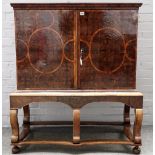 A late 17th century walnut and oyster walnut veneered cabinet, with isometric crossbandings,