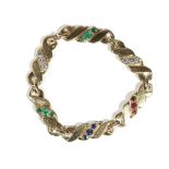 A gold, emerald, sapphire, ruby and diamond-set bracelet, by M Gerard,