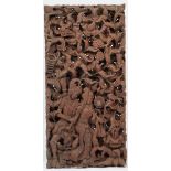 Four modern South East Asian hardwood panels, each intricately carved in deep relief,