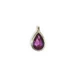A gold pendant, mounted with a pear shaped synthetic corundum imitating alexandrite. detailed 585.