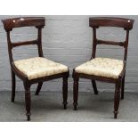 A pair of Regency mahogany side chairs on reeded supports, 48cm wide x 86cm high.