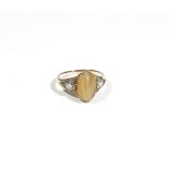 A cat's eye chrysoberyl and diamond-set dress ring, to oval cabochon cat's eye chrysoberyl,