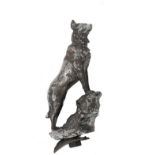 An early 20th century chromed metal car mascot depicting a German shepherd, signed 'Charle',