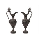 A pair of bronze ewers, after the antique, late 19th century,