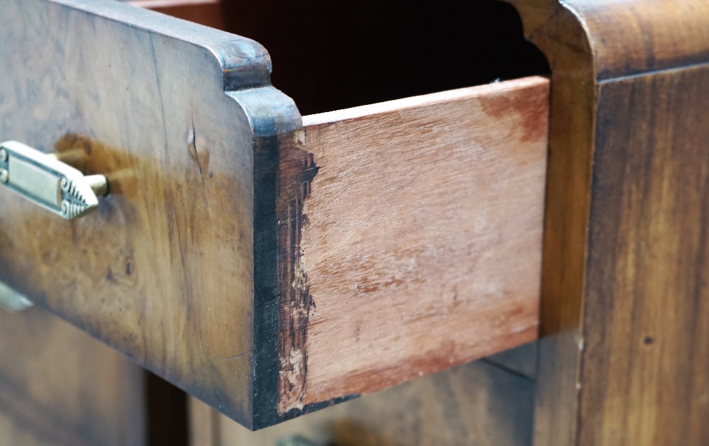 A pair of 1930s walnut three drawer bedside tables, on bracket feet, 27cm wide x 69cm high. - Image 3 of 3