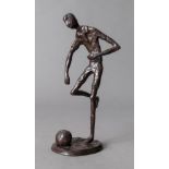 A cast bronzed figure of a footballer, 2