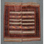 A Belouchi rug, with rows of repeated de