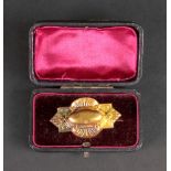 A Victorian 15ct gold brooch, designed a