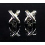 A pair of 18ct white gold earstuds, of c