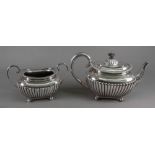 A Regency style silver teapot and sugar