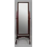 A mahogany cheval mirror, early 20th cen