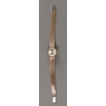 Oriosa: a lady's 9ct gold wristwatch, th