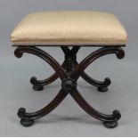 A late Regency rosewood 'x' frame dressing stool, with upholstered seat,