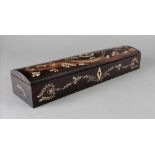 A narrow rectangular ebony and bone box,