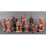 A group of nine Chinese small carved woo