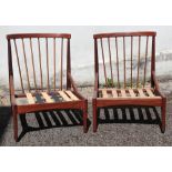 A pair of retro rosewood lounge chairs,